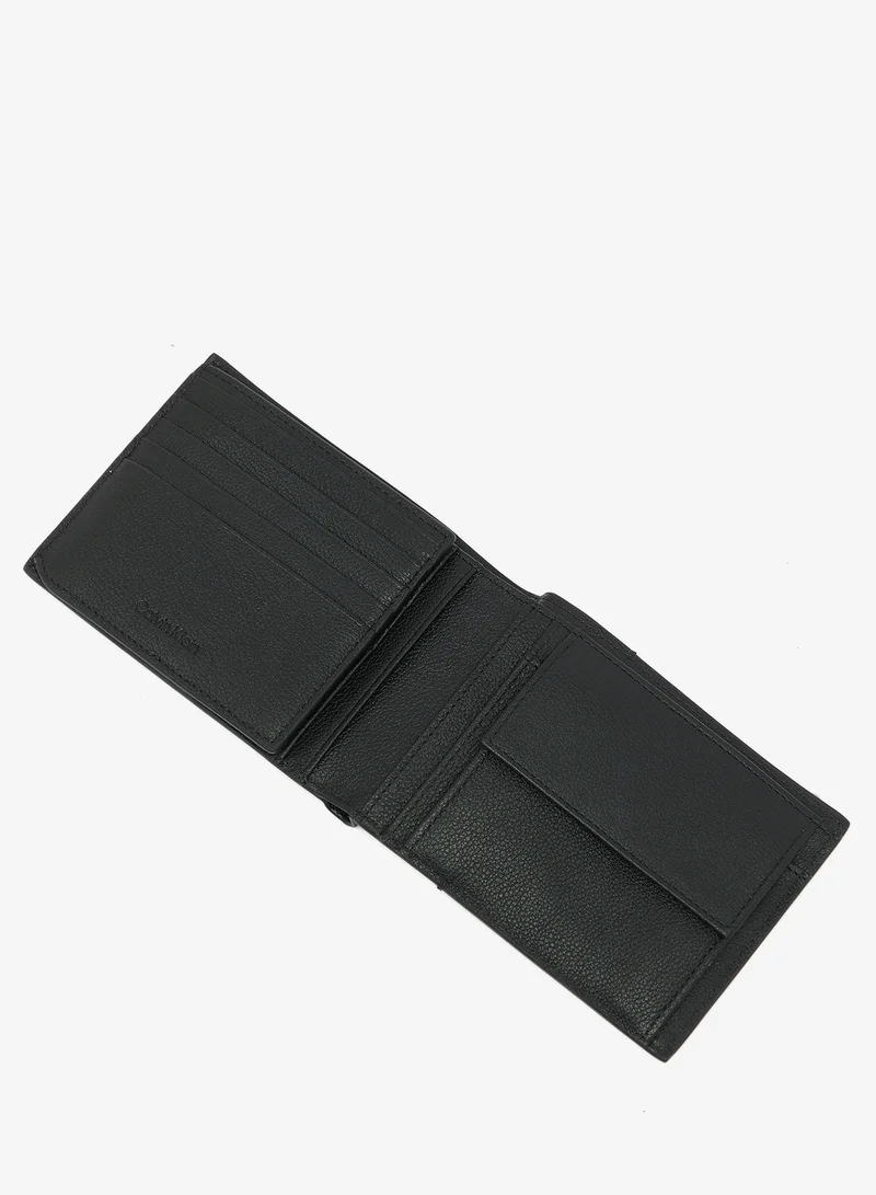 Calvin Klein Black Embossed Logo Trifold Wallet for Men | Best Price UAE