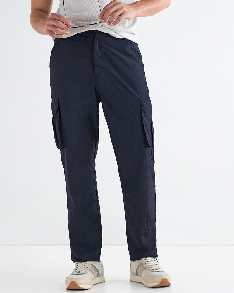 bewakoof Men's Navy Blue Cargo Nylon Parachute Pants - Image 1