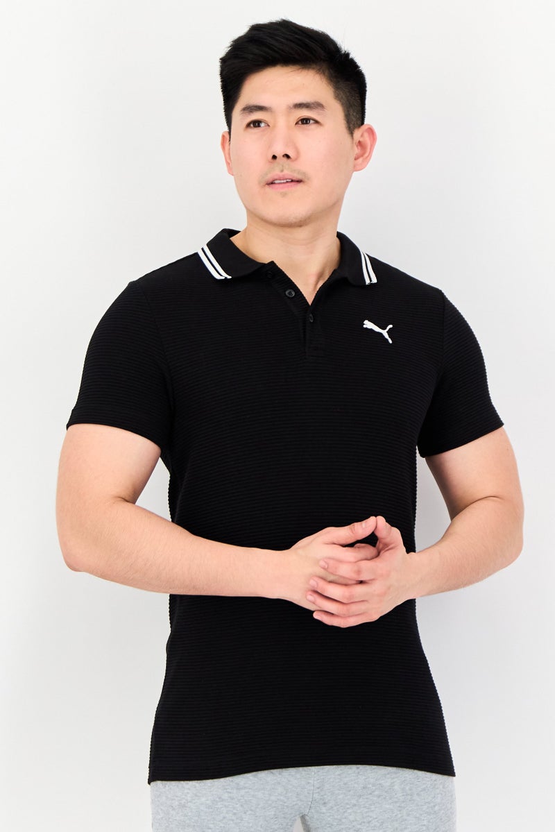 PUMA Men Sportswear Fit Short Sleeve Outdoor Polo Shirt, Black - Image 1