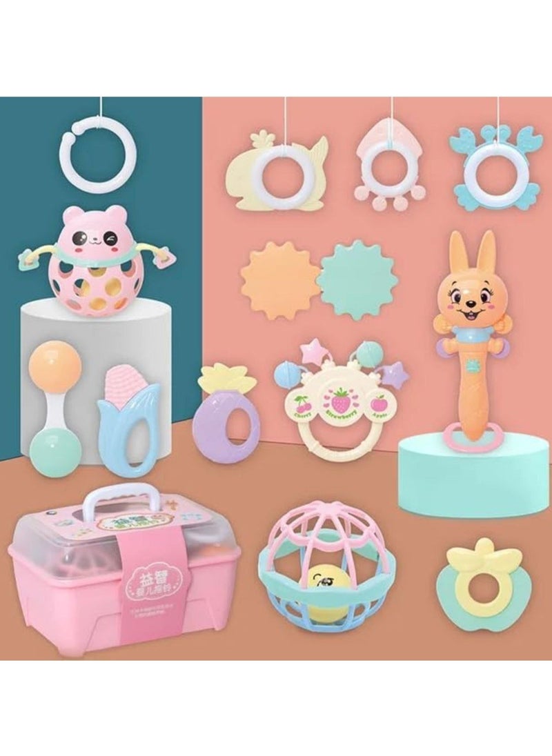 null - A box containing 13 pieces of silicone rattles and teethers in cheerful shapes and colors that help develop your child's skills. - Image 1