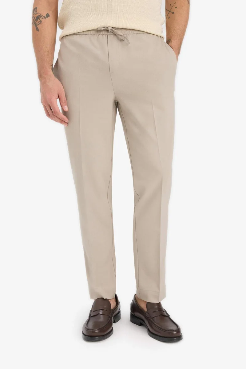 Defacto  Elastic Waistband and Pockets Stretchy Jogger Fit Trousers for Men | Best Price UAE