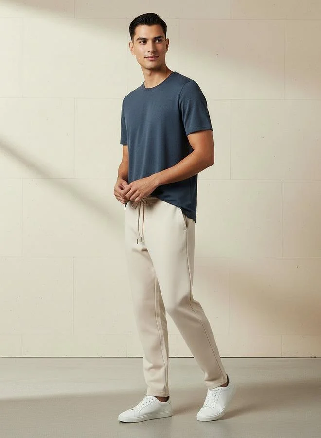 ايكونيك Iconic Men Slim Fit Crew Neck Short Sleeves Popcorn Textured T shirt