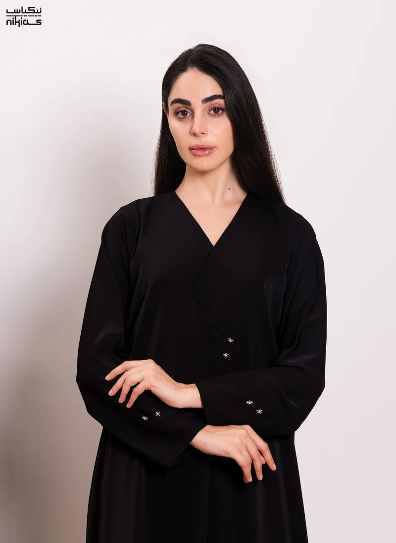 نيكياس Nikias Nida abaya with  zig zag design .