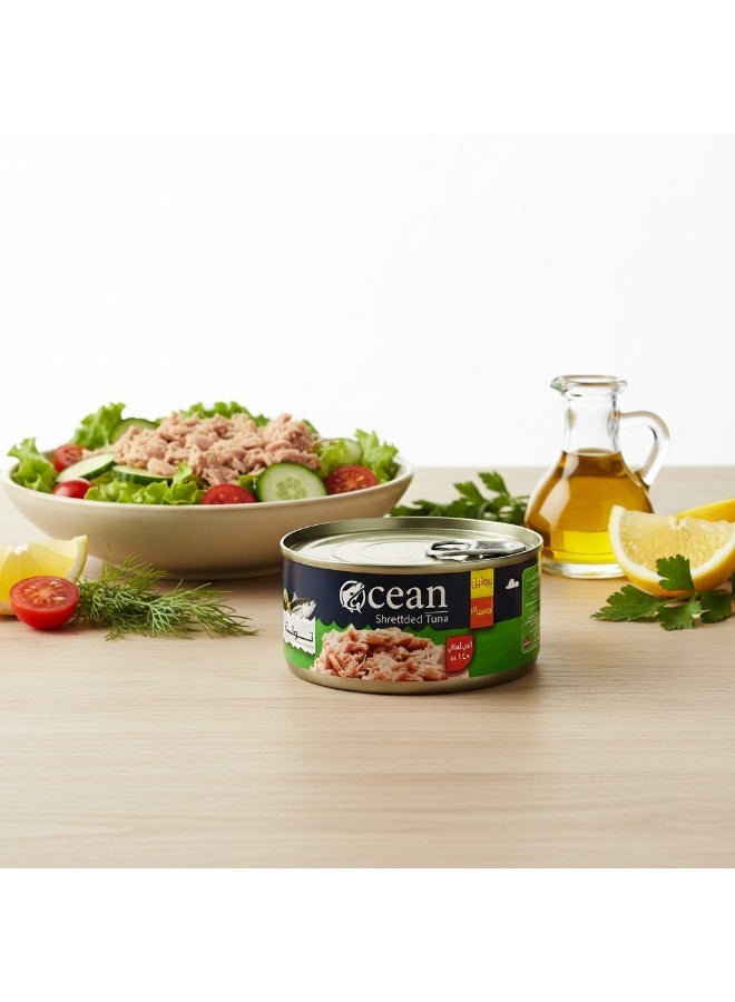 أوشن تونة مفتتة بزيت دوار الشمس 140 جم | تونة معلبة طبيعية | عالية البروتين وغنية بالأوميجا 3 | جاهزة للأكل - Image 2