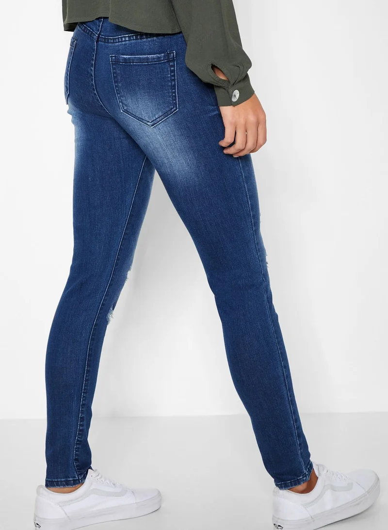 Ginger Ripped Skinny Jeans