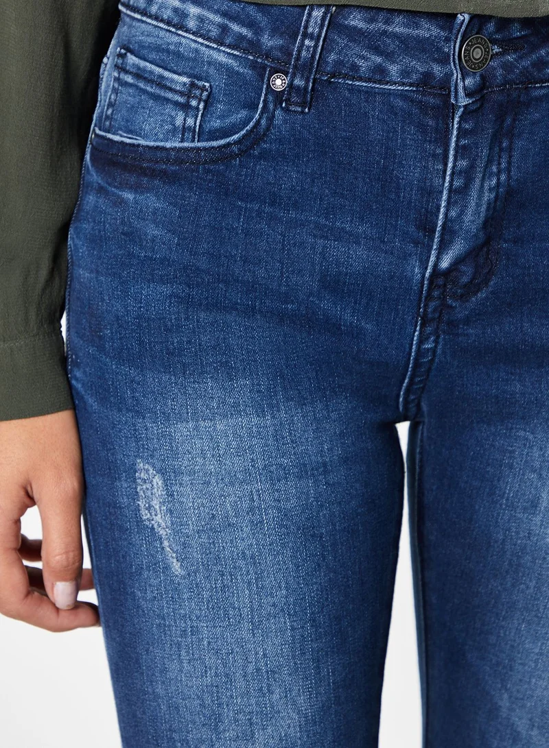 Ginger Ripped Skinny Jeans
