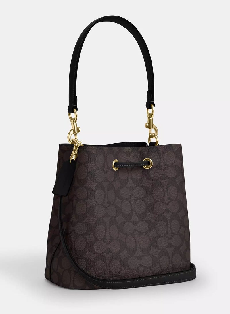 كوتش اوت ليت حقيبة كوتش روان دلو من القماش المميز مع حزام قابل للفصل، حقيبة كتف نسائية، حقيبة كروس نسائية، حقيبة توت نسائية، حقيبة يد نسائية، حقيبة سفر نسائية، لون الجوز الأسود - 22 سم - Image 2