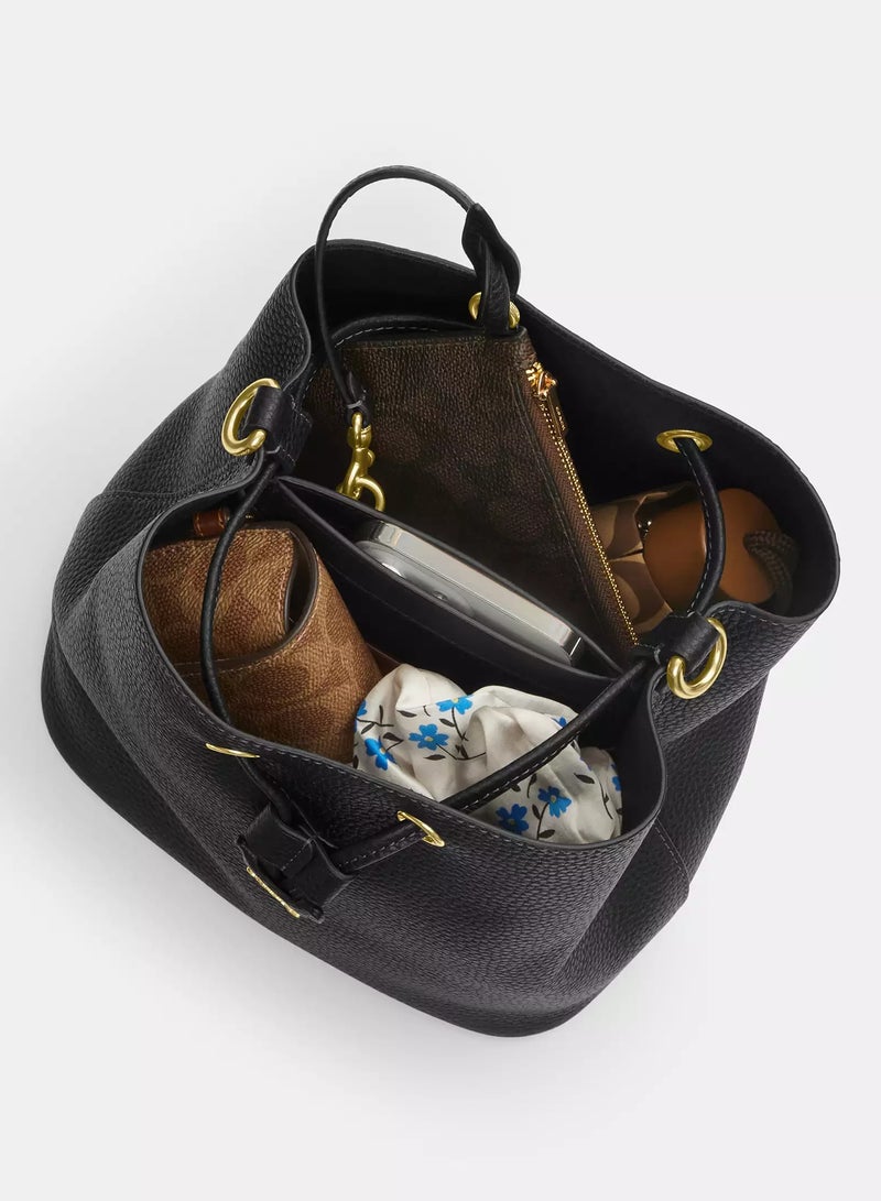 كوتش اوت ليت حقيبة كوتش روان دلو من القماش المميز مع حزام قابل للفصل، حقيبة كتف نسائية، حقيبة كروس نسائية، حقيبة توت نسائية، حقيبة يد نسائية، حقيبة سفر نسائية، لون الجوز الأسود - 22 سم - Image 3