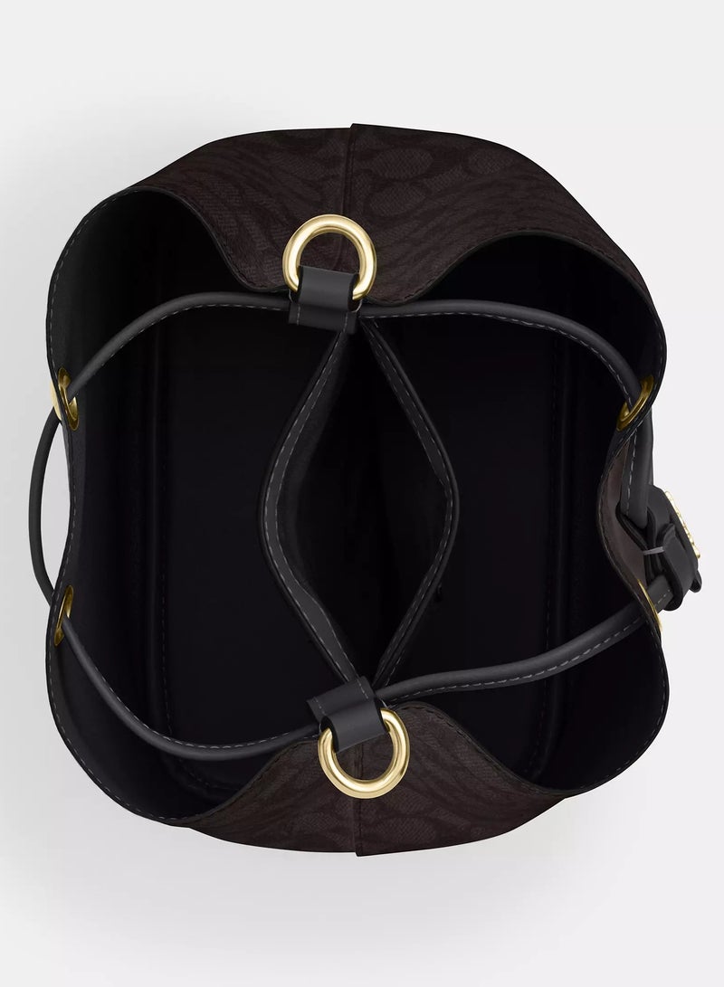 كوتش اوت ليت حقيبة كوتش روان دلو من القماش المميز مع حزام قابل للفصل، حقيبة كتف نسائية، حقيبة كروس نسائية، حقيبة توت نسائية، حقيبة يد نسائية، حقيبة سفر نسائية، لون الجوز الأسود - 22 سم - Image 4