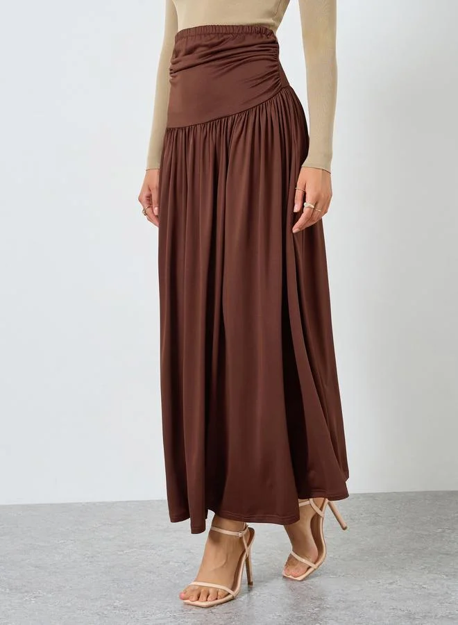 Styli Brown Solid A-Line Pleated Knit Maxi Skirt