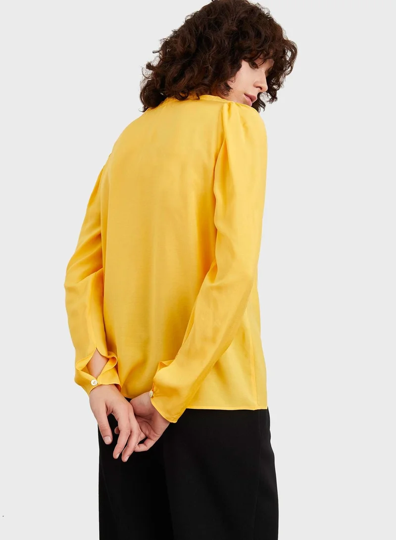 اي دي ال بلوزة بياقة كشكش