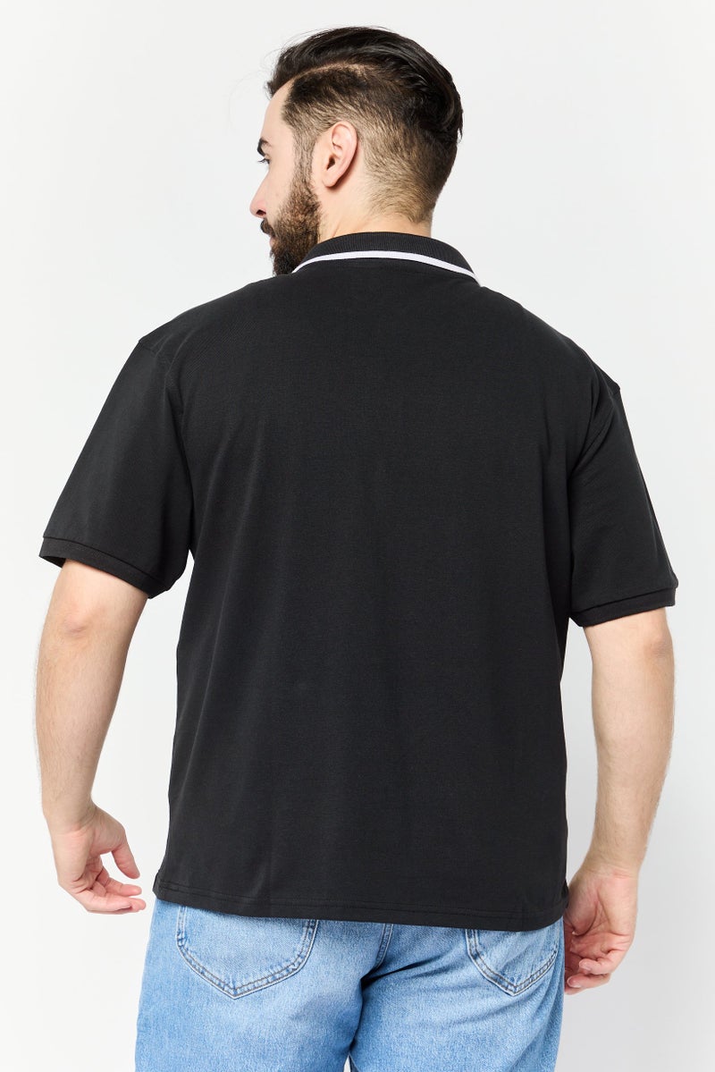 Paul Frank تي شيرت بولو بأكمام قصيرة للرجال بتصميم عادي مع شعار العلامة التجارية، أسود - Image 4
