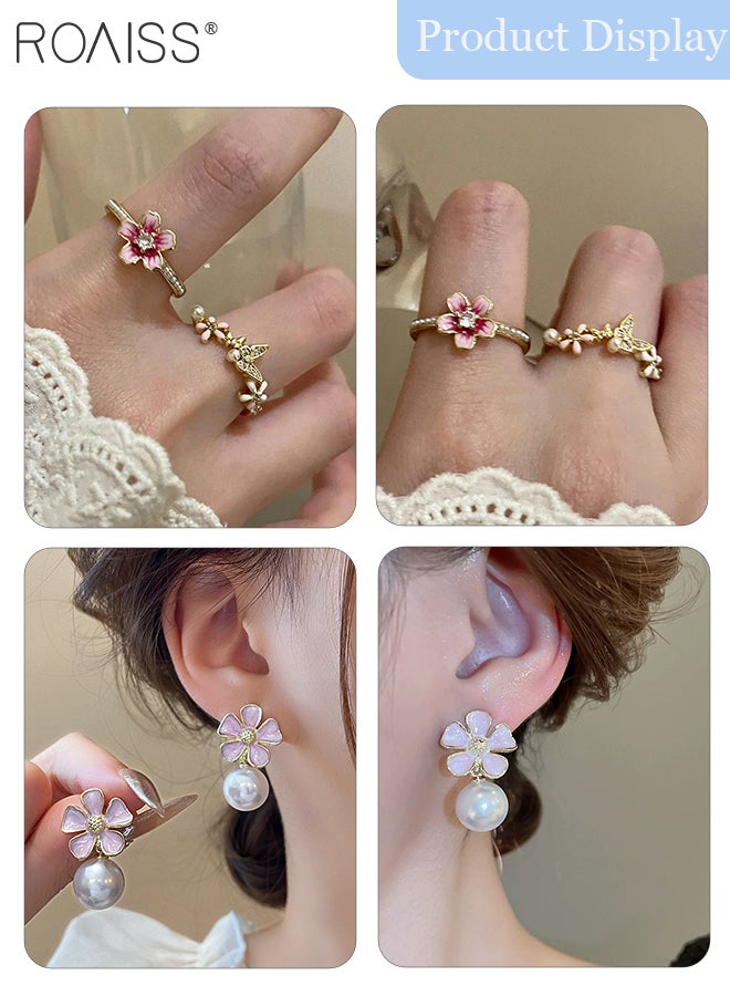 رويس مجموعة مجوهرات مكونة من 4 قطع من أقراط الزهور والخواتم، قطعتان من حلقات زهرة الكرز الوردي المفتوحة، قطعتان من أقراط الزهور المتقطرة مع اللؤلؤ الأبيض، مناسبة للحفلات وحفلات الزفاف والارتداء اليومي - Image 3