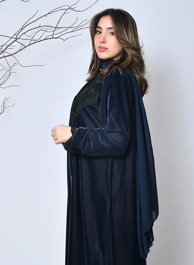HAWRAA ABAYA A luxurious navy velvet winter abaya with an elegant design and refined embroidery