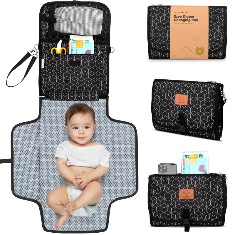 KeaBabies Portable Diaper Changing Pad - Large Waterproof Baby Changing Mat, Compact Travel Diaper Clutch, Functional Pockets Fit Newborn Essentials, Wipeable  Padded Baby Changer (Black Geo) - Image 1