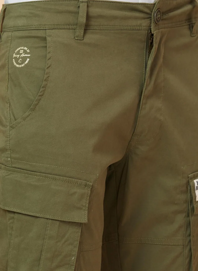 Being Human OLIVE Men Mid-Rise Plain Cotton Slim Fit Cargos Trouser for Men | Best Price UAE