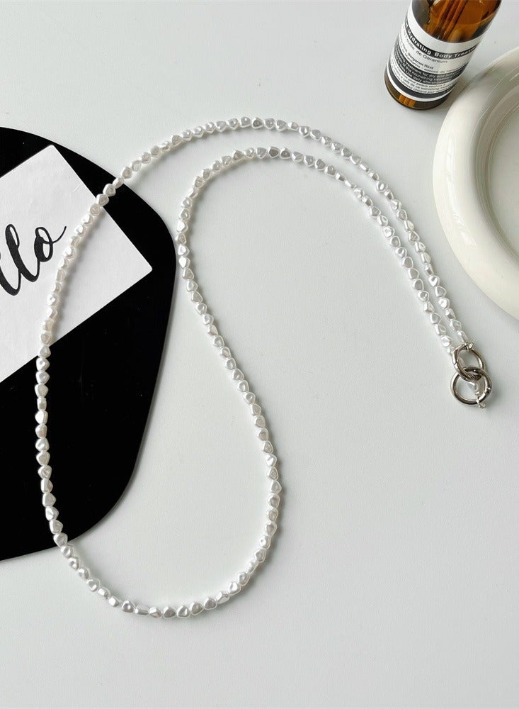 حبل هاتف عالمي، سلسلة هاتف مزينة بخرز لؤلئي غير منتظم، حزام كتف مضاد للسرقة قابل للفصل للنساء، يُرتدى حول الرقبة مع لاصقات متوافق مع آيفون ومعظم الهواتف الذكية - Image 1