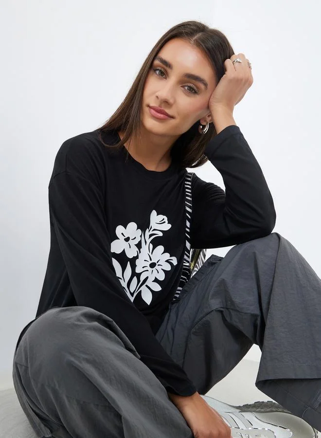 Styli  Black Floral Graphic Long Sleeve T-Shirt for Women | Best Price UAE