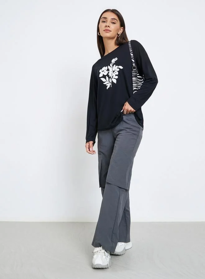 Styli  Black Floral Graphic Long Sleeve T-Shirt for Women | Best Price UAE