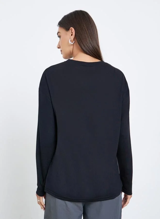 Styli  Black Floral Graphic Long Sleeve T-Shirt for Women | Best Price UAE