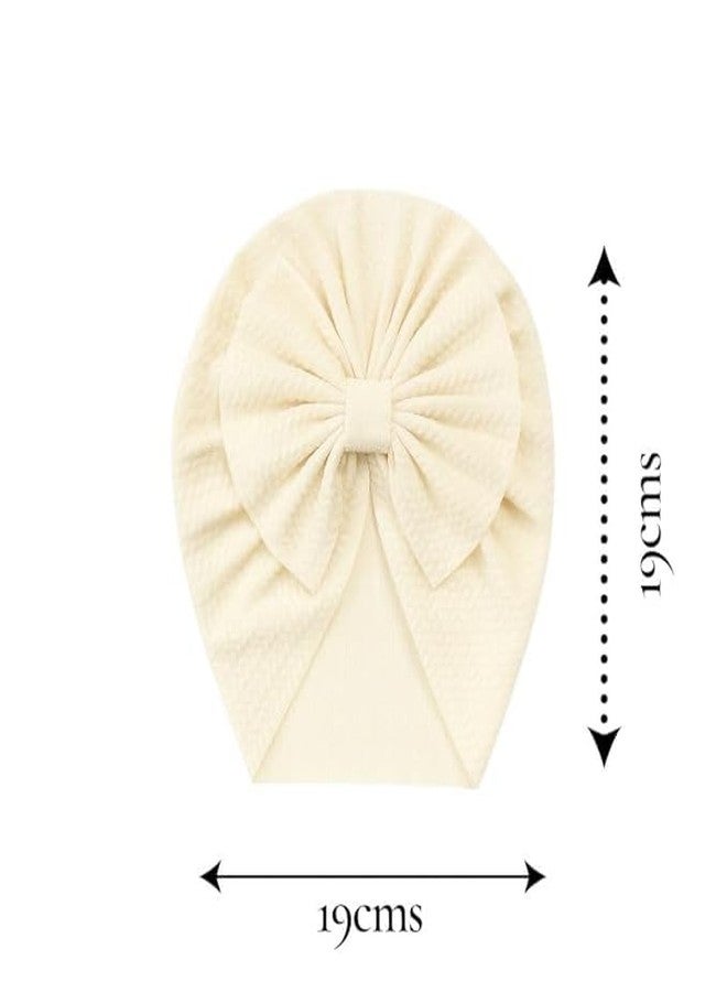FAMWRAPZ Baby Turban Cap with Big Bow - Soft Knotted Beanie Cap Headwrap for Infants, Toddlers & Kids (0-3 Years) Cream - Image 4