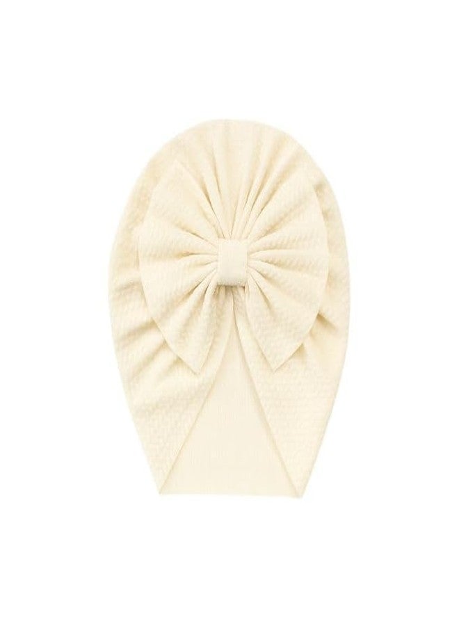 FAMWRAPZ Baby Turban Cap with Big Bow - Soft Knotted Beanie Cap Headwrap for Infants, Toddlers & Kids (0-3 Years) Cream - Image 1