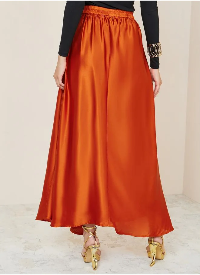 Styli High Rise Satin Flared Maxi Skirt