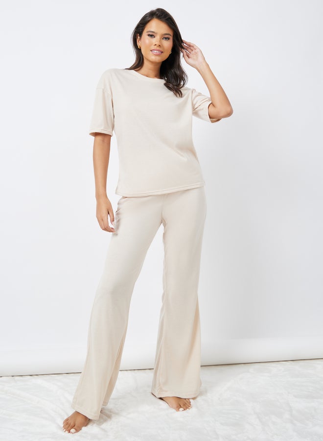 Styli Styli Drop Shoulder Oversized T-Shirt and Flared Pyjama Set  - Image 1