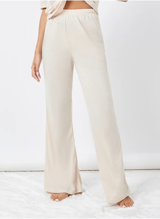 ستايلي Styli Drop Shoulder Oversized T-Shirt and Flared Pyjama Set