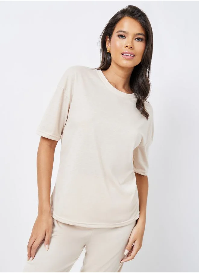 ستايلي Drop Shoulder Oversized T-Shirt & Flared Pyjama Set