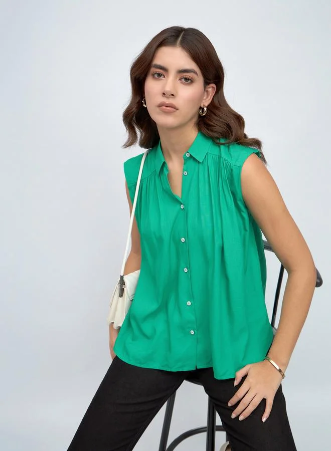 دينيس لينغو قميص كاجوال بدون أكمام بأزرار من ستايلي