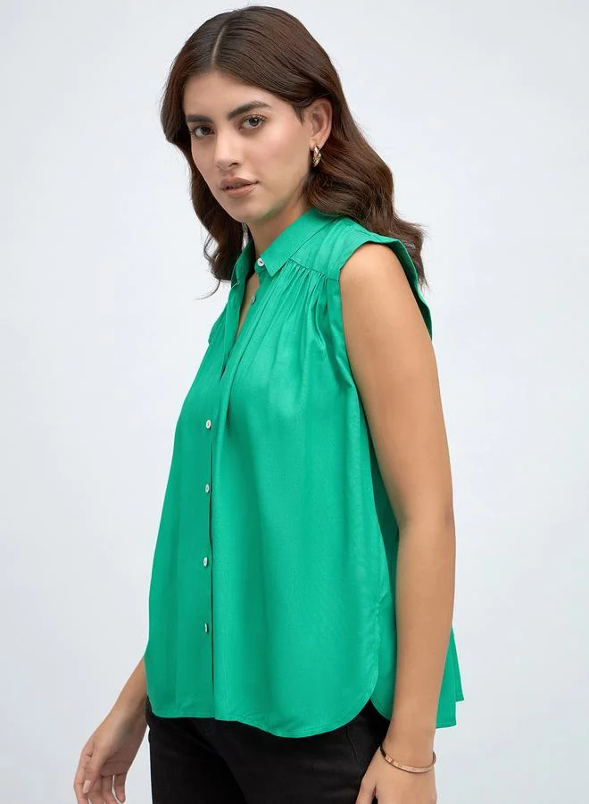 دينيس لينغو قميص كاجوال بدون أكمام بأزرار من ستايلي