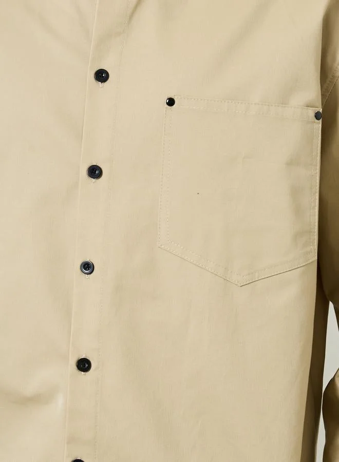 ستايلي قميص قطني بقصة واسعة