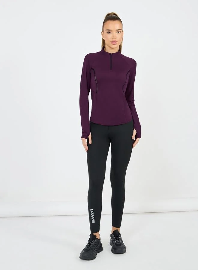 Styli Active Half Zip Body Contour Stitch and Peep Mesh Insert Top
