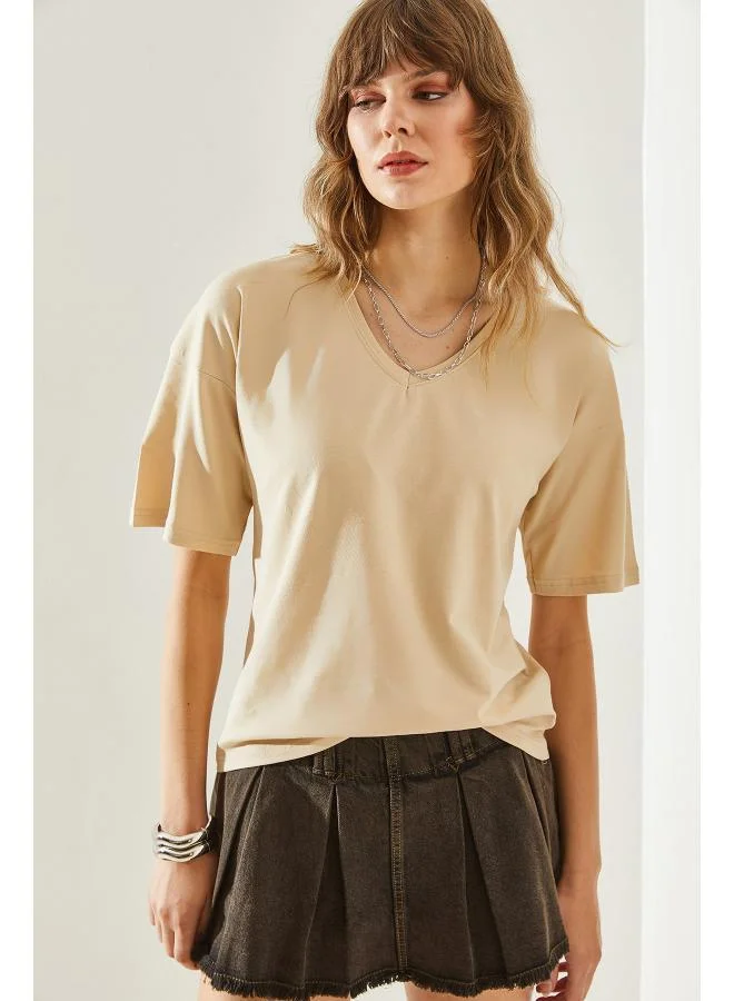 جينجر بيسيكس تي شيرت بياقة على شكل حرف  وقصة مريحة