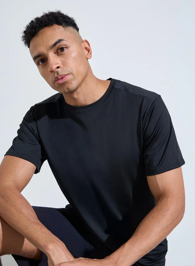 ستايلي اكتيف Men Black Solid Regular Fit Activewear T-Shirt