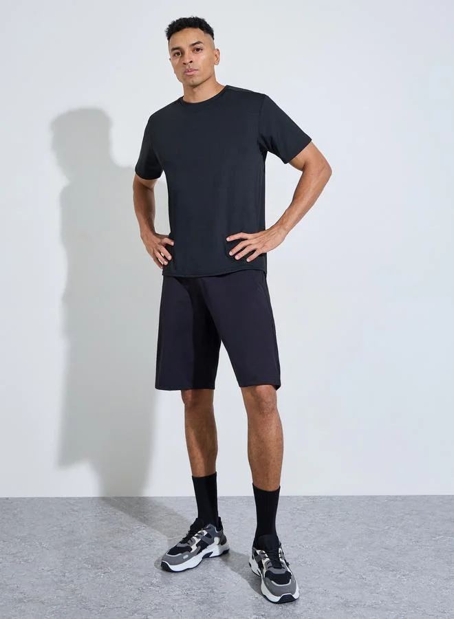 ستايلي اكتيف Men Black Solid Regular Fit Activewear T-Shirt