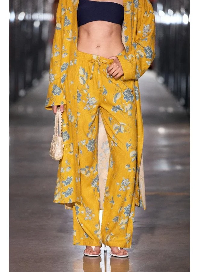 Grimelange NARCIS Women's Linen-Blend Elastic Waist Comfortable Fit Pants with Detailed Yellow Print.