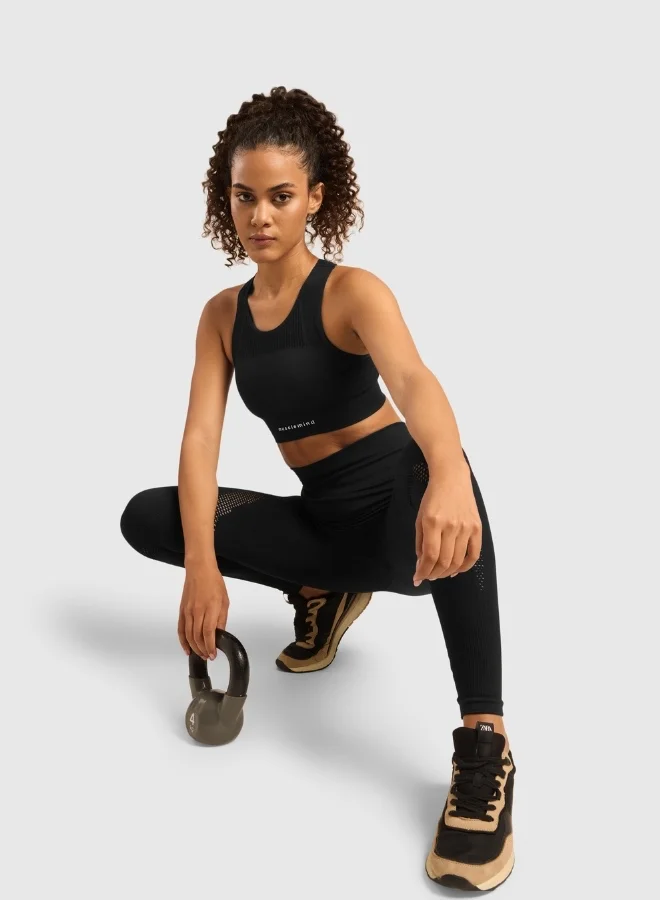 Musclemind Seamless Sports Bra for Gym Workout and Fitness with rib structure for Posture Assistance, anti-odour, anti-microbial, 4 way stretch, wide straps with removable pads, offers medium support, super soft fabric mesh with quick drying activewear