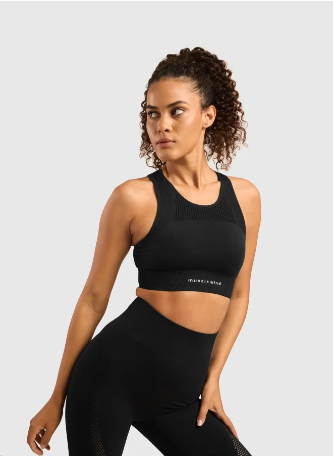 ماسلميند Seamless Sports Bra for Gym Workout and Fitness with rib structure for Posture Assistance, anti-odour, anti-microbial, 4 way stretch, wide straps with removable pads, offers medium support, super soft fabric mesh with quick drying activewear
