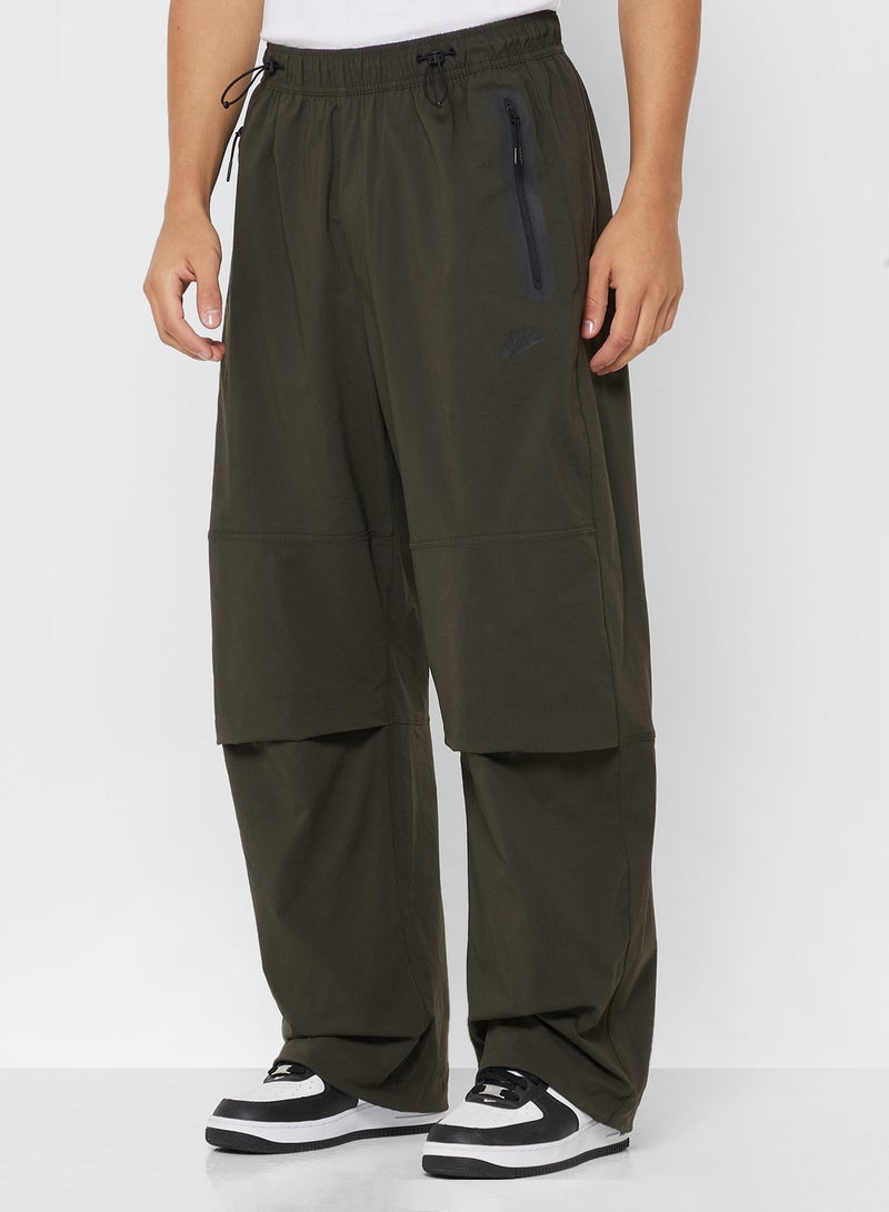 نايكي بنطلون رياضي واسع منسوج تقني - Image 1