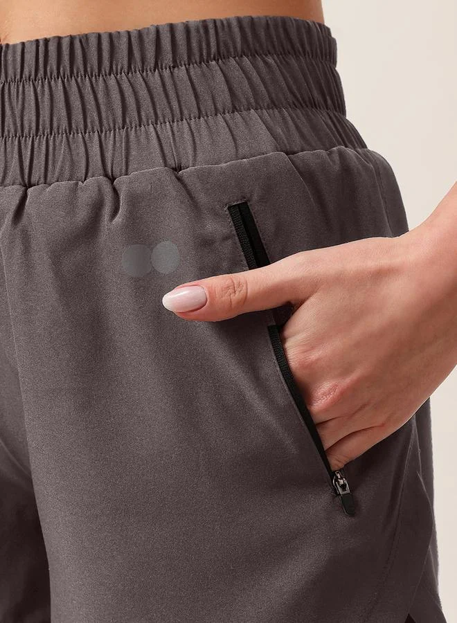 Clovia  Dark Grey Solid Running Shorts With Zip Pockets for Women | Best Price UAE