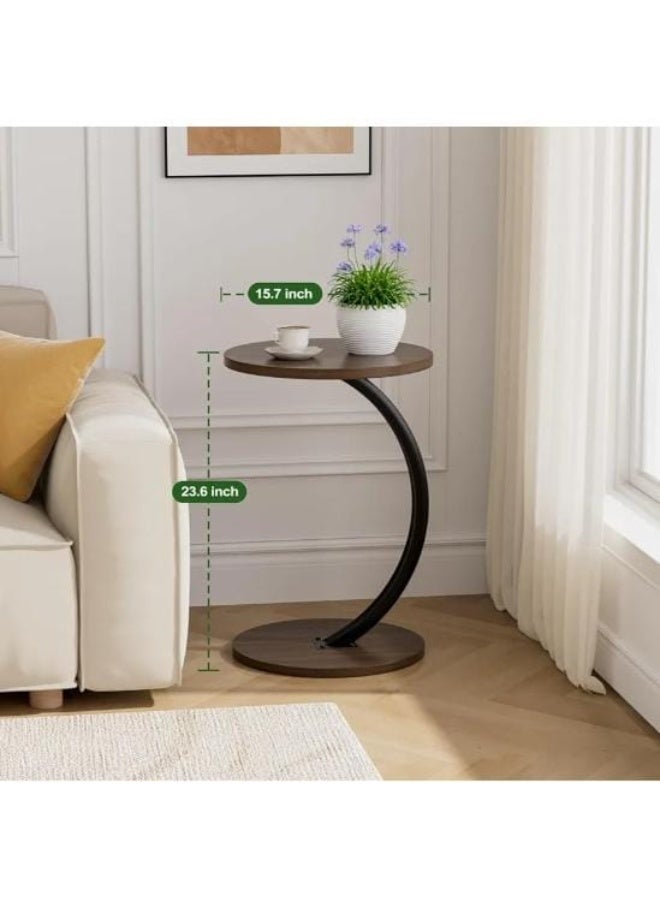A modern C-shaped side table with a stylish oval top and sturdy metal legs = elegance and practicality in one! It slides easily under a sofa or bed and is perfect for coffee, your laptop, or your favorite book. Its contemporary design adds a decorative touch to any corner. - Image 3