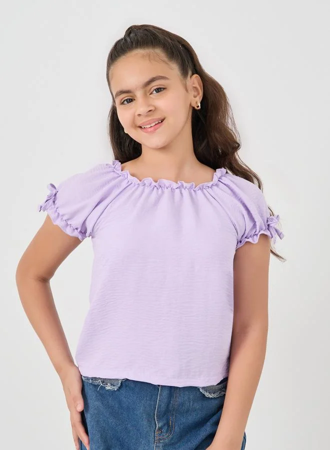 ستايلي بلوزة ستايلي بأكمام منتفخة وقصة عادية