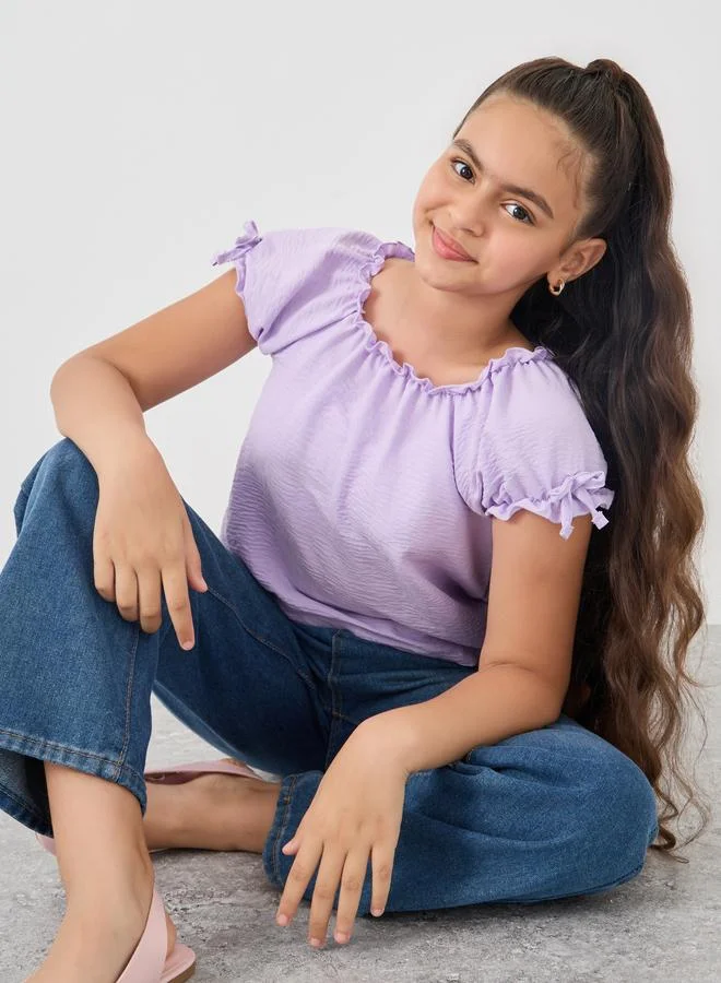 ستايلي بلوزة ستايلي بأكمام منتفخة وقصة عادية