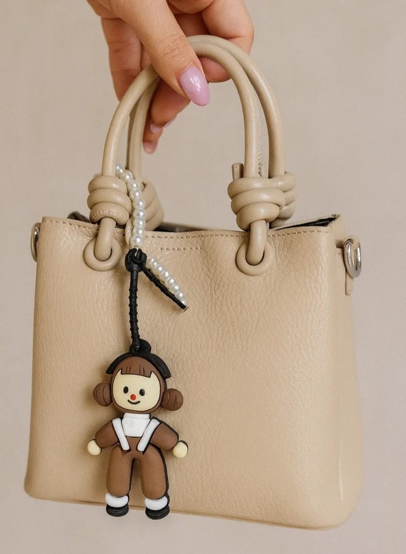 Women’s Medium Leather Crossbody Handbag with Cute Doll Charm – Elegant Design for Daily Use - Image 3