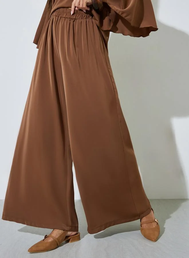 Styli  Brown Solid Flared Sleeve Asymmetrical Hem Top and Wide Leg Pants Co-Ords for Women | Best Price UAE