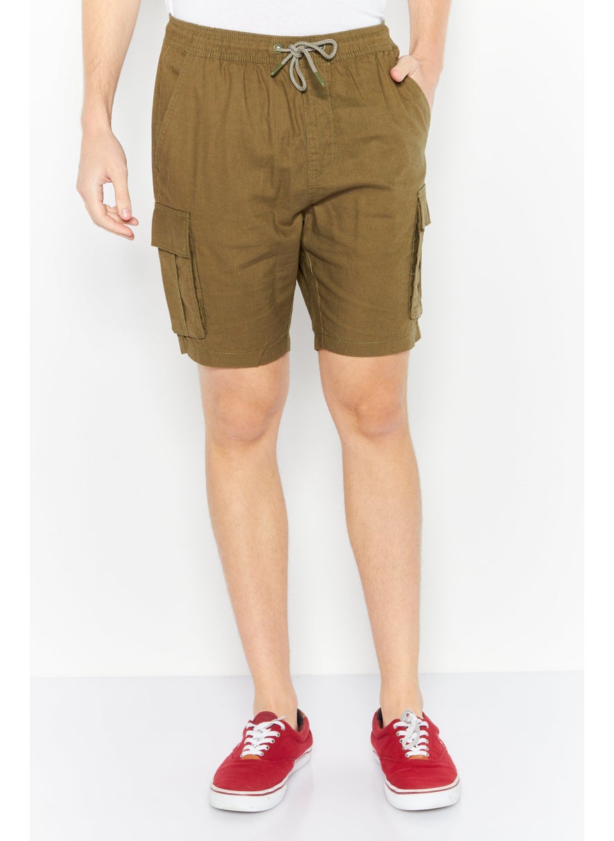 Men Regular Fit Solid Cargo Short, Army Green - pzsku/ZD933FE6F112D2C347754Z/45/_/1727187855/35b0f901-016b-4fbf-95a0-ad5f3cbc508b