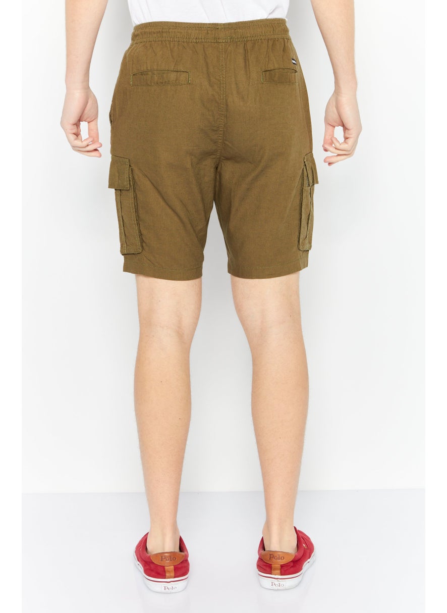 Men Regular Fit Solid Cargo Short, Army Green - pzsku/ZD933FE6F112D2C347754Z/45/_/1727187923/39d2b1d5-3d2e-46c6-94d6-d84ca5beac44