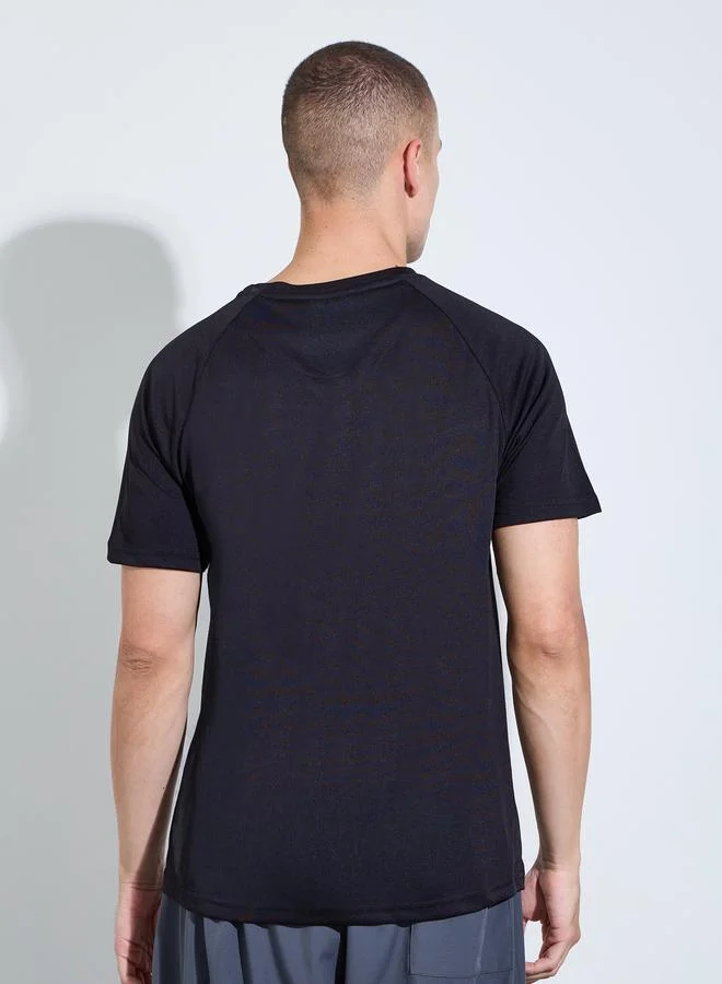 Styli Active Black Men Black Graphic Print Raglan Sleeves Regular Fit T-Shirt for Men | Best Price UAE